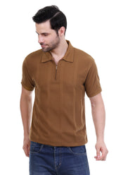 Man wearing a brown textured polo shirt on a white background