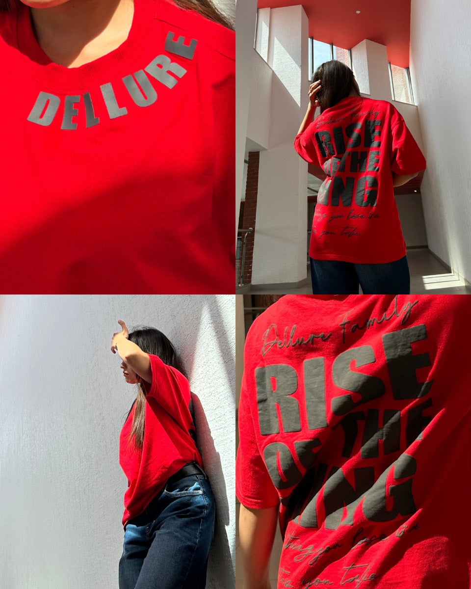 Close-ups of a Dellure red oversized t-shirt with Rise of the King back print